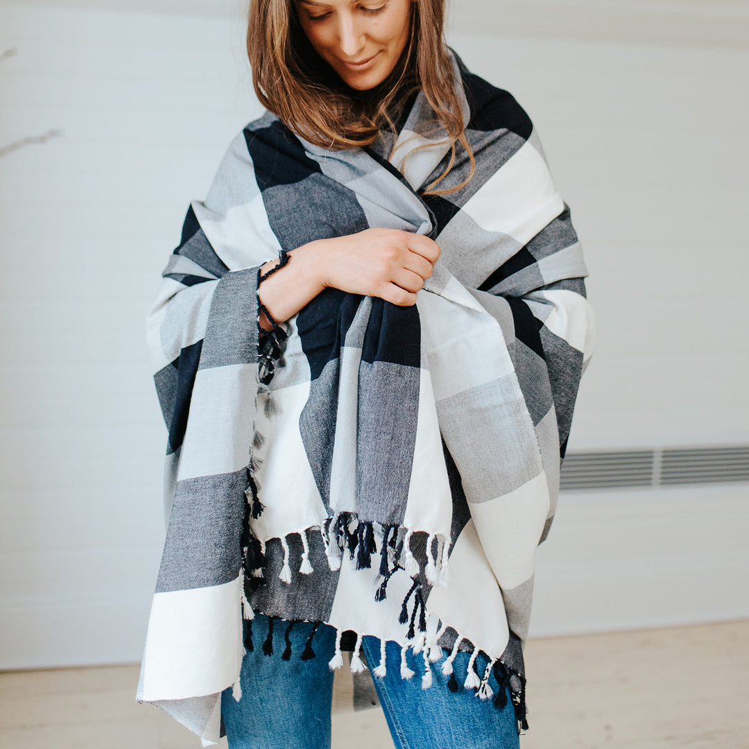 Black and white check throw that can be worn as a shawl, scarf or wrap. 