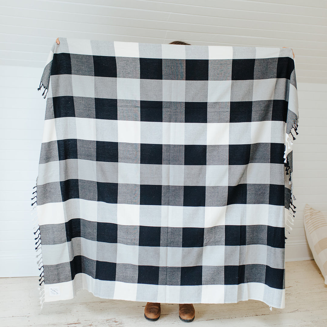 throw size monochrome blanket by Earth Worthy. Kind to the World. 